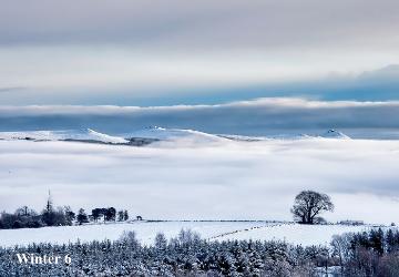 JF Peaks above clouds.jpg